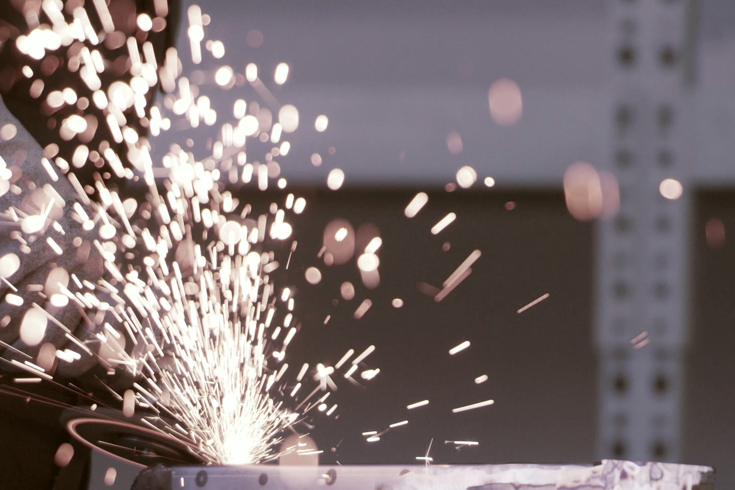 Sparks thrown from cut steel.